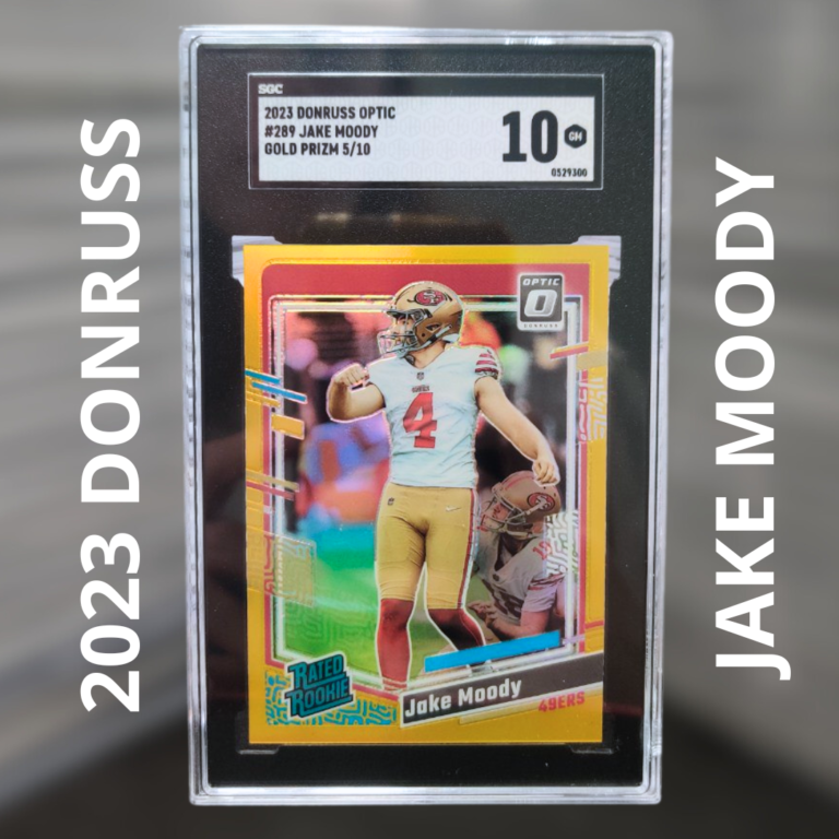 An SGC-graded 2023 Donruss Optic #289 Jake Moody Gold Prizm rookie card in a clear slab, showing Moody in his San Francisco 49ers uniform with a vibrant gold-and-holographic border, set against a softly blurred neutral background.
